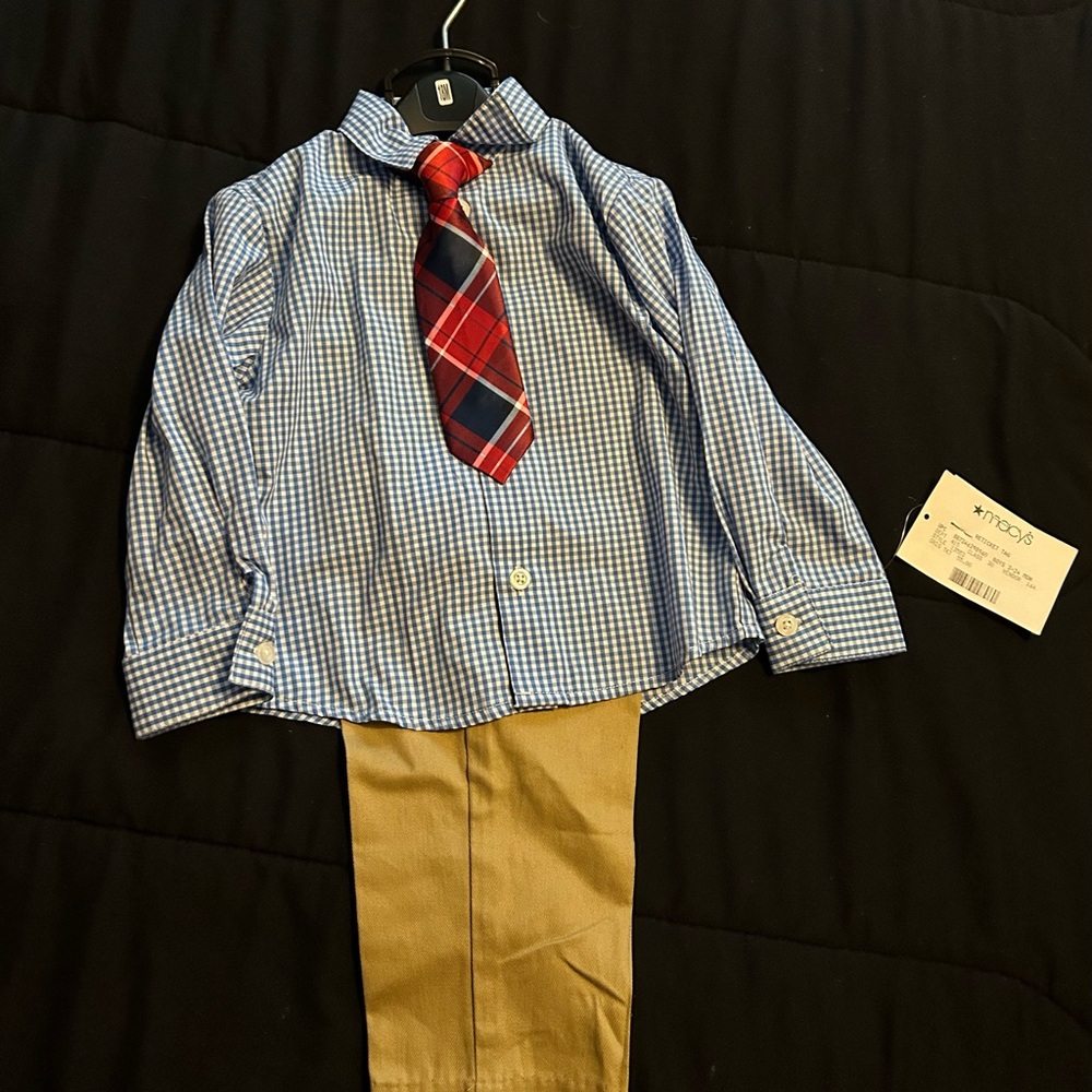Blue Checkered Shirt with Red Plaid Tie and Tan Pants